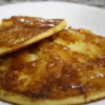 Pineapple upside down pancakes on their griddle