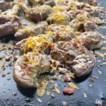 Blackstone Smashed Potatoes (Cheese & Bacon)