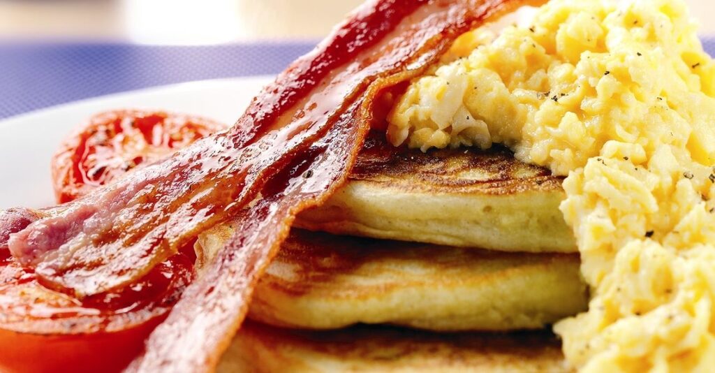 Pancakes, eggs and thick cut bacon