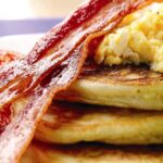 Pancakes, eggs and thick cut bacon