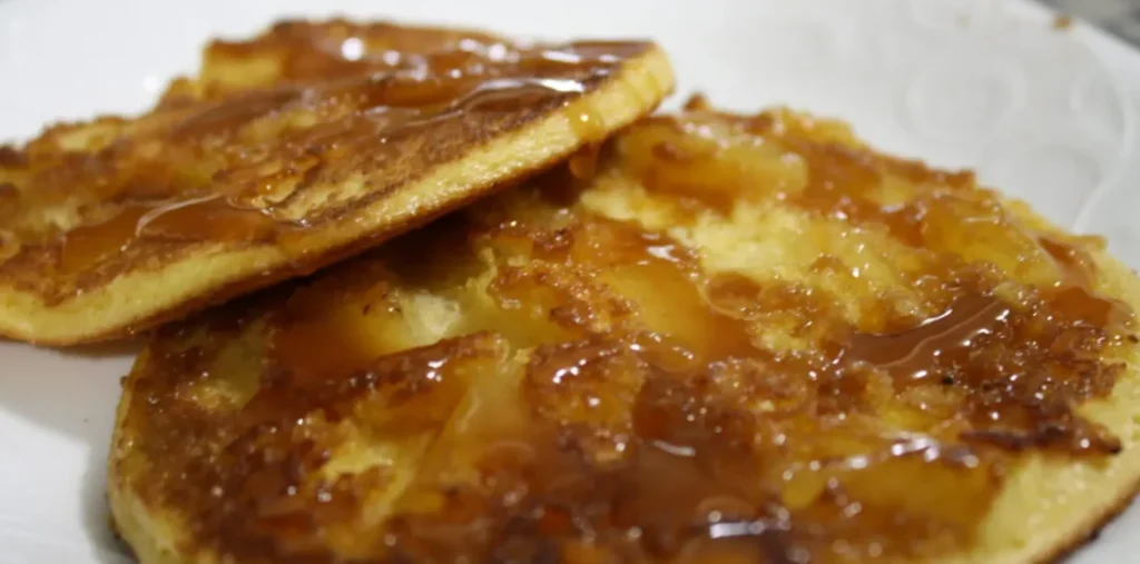 Pineapple upside down pancakes on their griddle