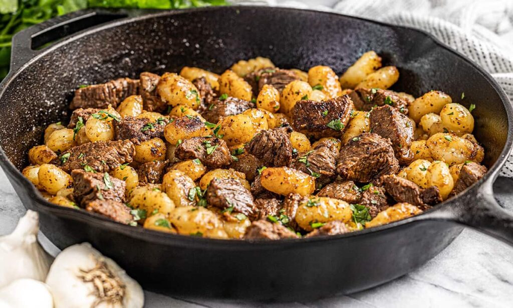 Marinated steak bites, gnocchi and mushrooms.