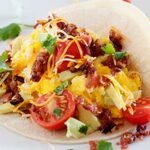 Breakfast Tacos. Bacon, eggs cheese and corn tortillas